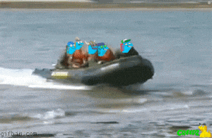 a group of people in a boat with a gifbin.com logo behind them