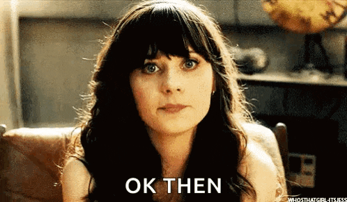 a woman is sitting in a chair and says ok then