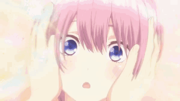 a girl with pink hair and blue eyes has her hands on her face