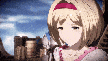 a girl with blonde hair and a pink headband stands in front of barrels