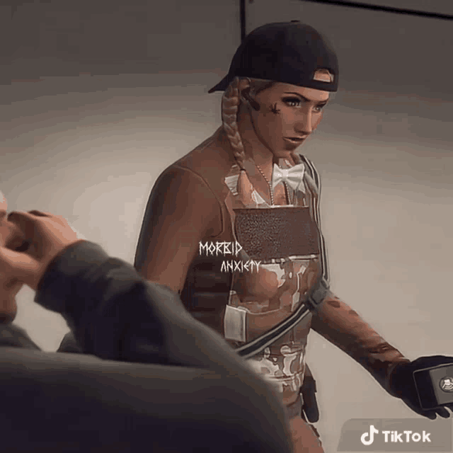 a woman with a tattoo on her face has the word anxiety on her shirt