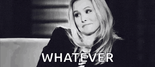 a woman is sitting on a couch in a black and white photo with the words `` whatever '' written on the bottom .