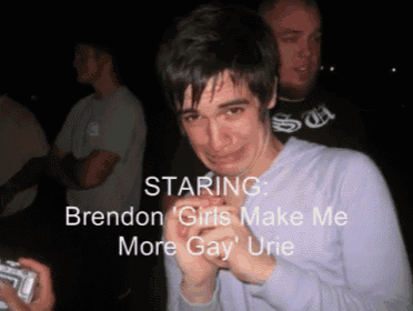 a man making a funny face with the words staring brendon girls make me more gay urie above him