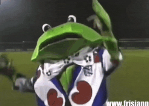 a frog mascot is wearing a blue and white jersey with hearts