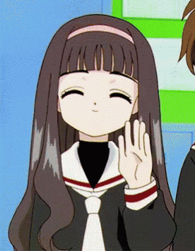 a girl in a school uniform is smiling and giving a high five