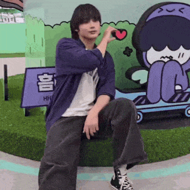 a man in a purple jacket is kneeling down in front of a cartoon character and holding a heart .