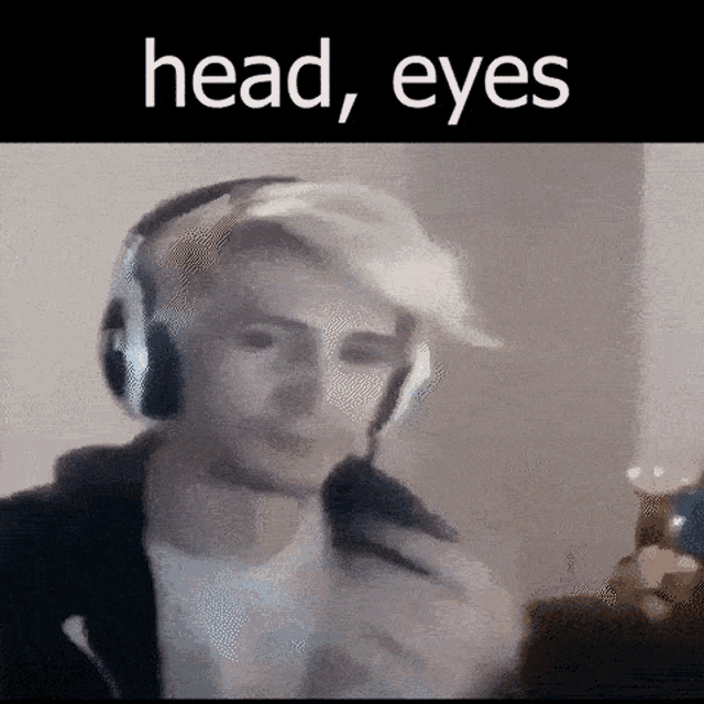 a man wearing headphones looks at the camera with the words head eyes above him