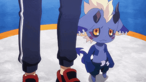 a person standing next to a small purple monster