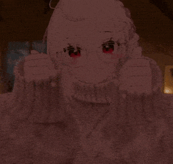 a girl wearing glasses and a sweater is giving a thumbs up sign