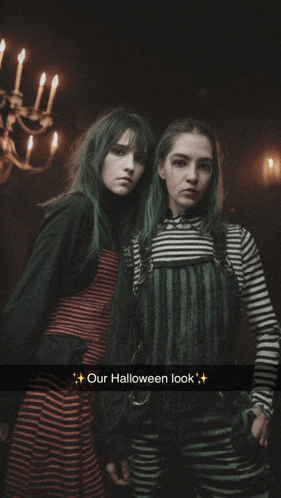 a couple of girls standing next to each other with the caption our halloween look