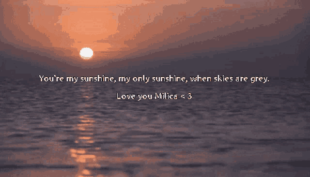 a sunset over a body of water with the words you 're my sunshine
