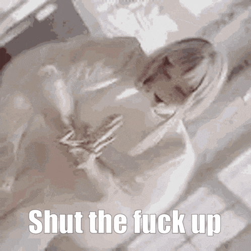 a picture of a woman with the words shut the fuck up