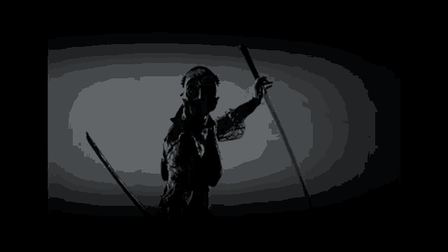 a black and white photo of a man holding a sword with flaco written on the bottom right