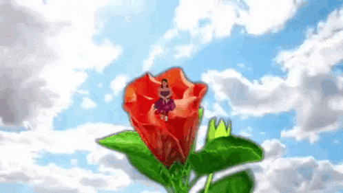 a woman in a purple dress is sitting on a red rose against a blue sky with clouds .