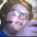 a person wearing glasses and a headset is taking a selfie .