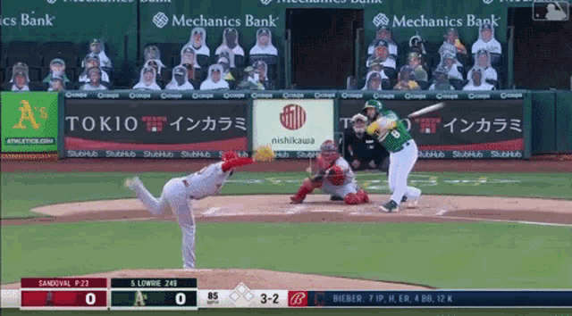a baseball game is being played with advertisements for mechanics bank and tokio