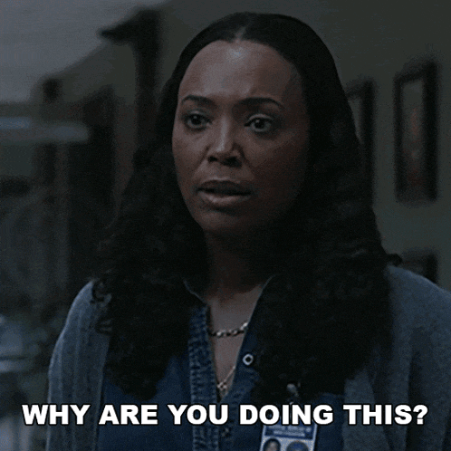 a woman with a name tag that says ' why are you doing this '