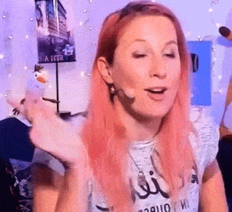 a woman with pink hair is wearing a t-shirt that says ibiza