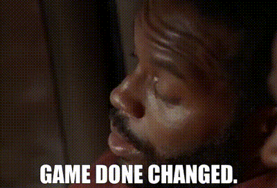 a close up of a man 's face with the words game done changed .