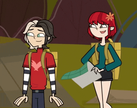 a boy and a girl standing next to each other