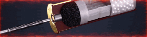 a close up of a shotgun shell with a flame coming out of it
