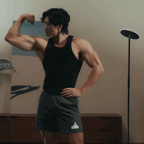 Showing Muscles Benji Kil GIF