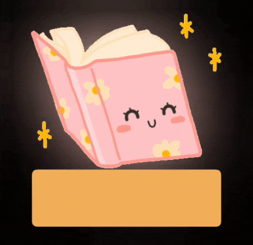 a pink book with a smiling face on it