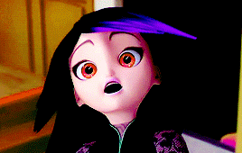 a close up of a cartoon character 's face with a surprised look on her face