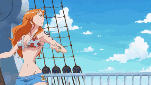 a woman in a bikini is standing on a balcony with a blue sky in the background