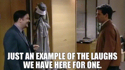 two men are standing next to each other in a hallway with the words just an example of the laughs we have here for one