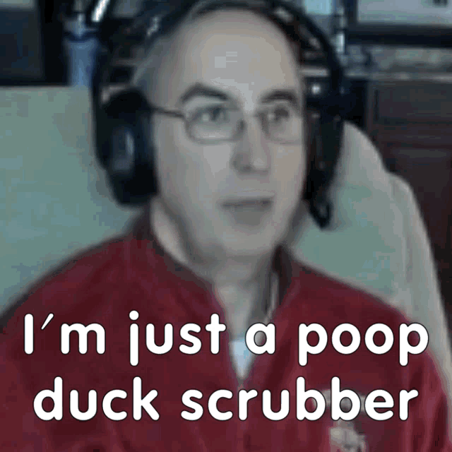 a man wearing headphones and a red shirt says i 'm just a poop duck scrubber