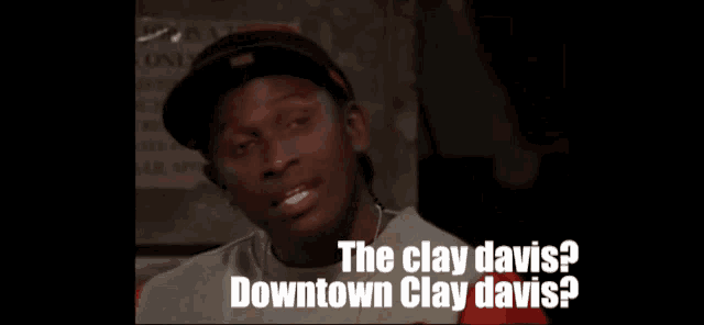 a man wearing a hat says " the clay davis "