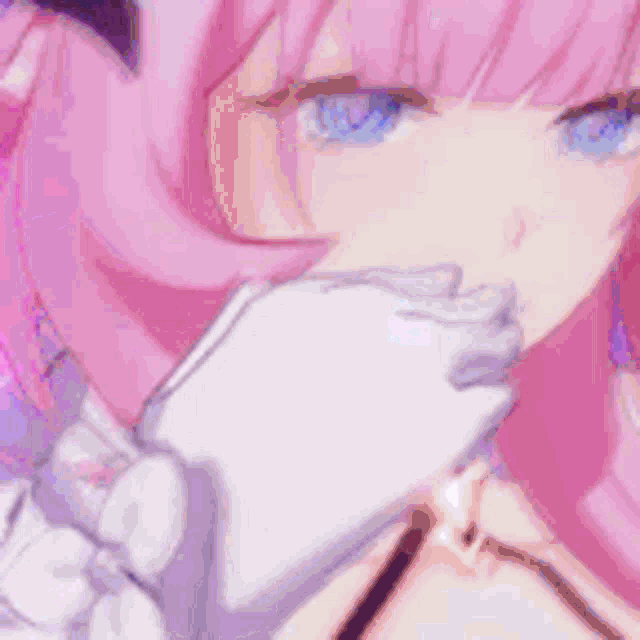 a close up of a pink haired anime girl laying on a purple surface .