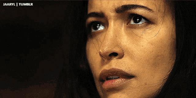a close up of a woman 's face with the words jaaryl tumblr visible