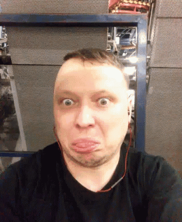 a man making a funny face with his mouth open