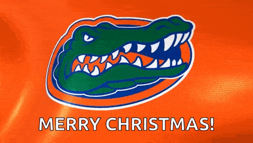 the florida gators logo is on an orange background with the words merry christmas .