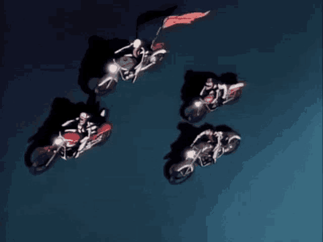 a group of people are riding motorcycles in a circle in the sky .