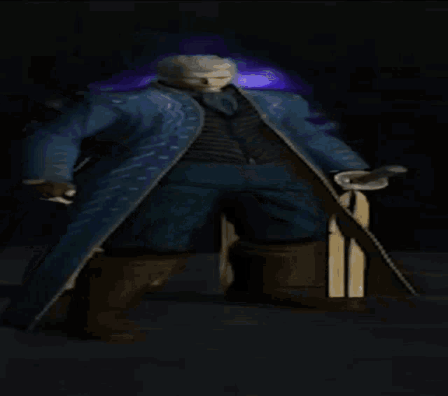 a man in a blue coat is holding a sword in a dark room