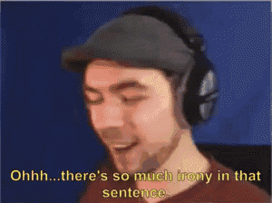 a man wearing headphones says ohhh there 's so much irony in that sentence