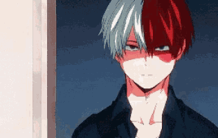 a close up of a man with red and white hair