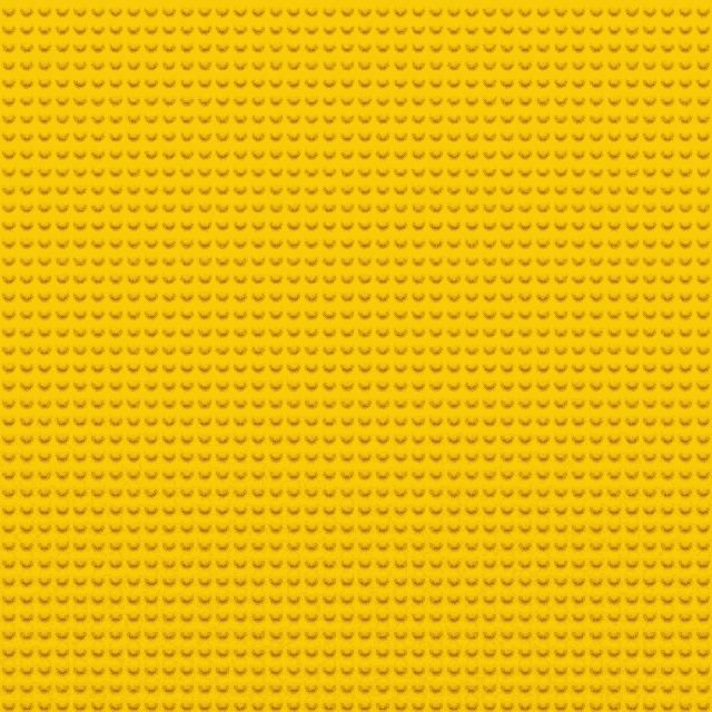 a close up of a red and yellow polka dot pattern on a piece of fabric .