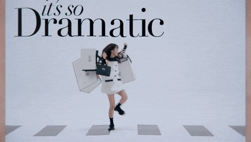 a woman holding shopping bags with the words " it 's so dramatic " on the bottom