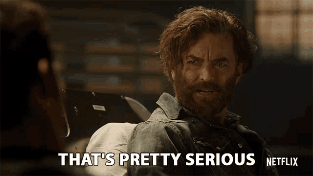 a man with a beard is saying that 's pretty serious