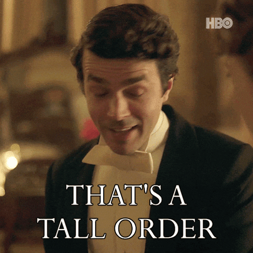 a man in a tuxedo with the words that 's a tall order below him