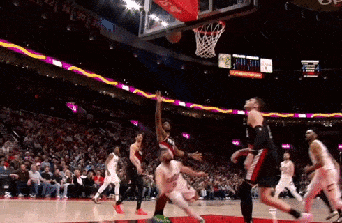 a basketball game is being played with the score being 30 to 14