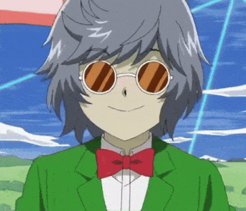 a person wearing sunglasses and a bow tie is smiling