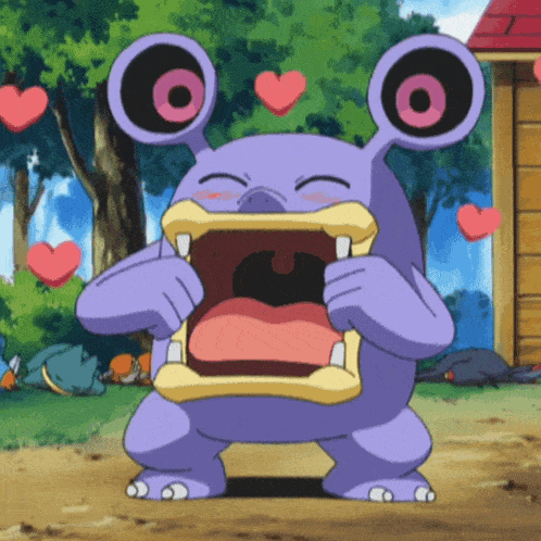 a purple monster with hearts around it 's eyes
