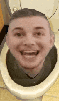 a man with his mouth open is sitting in a toilet