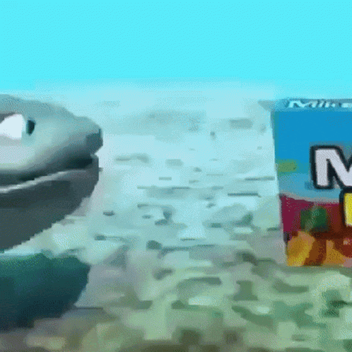 a box of mikes juice sits next to a cartoon character