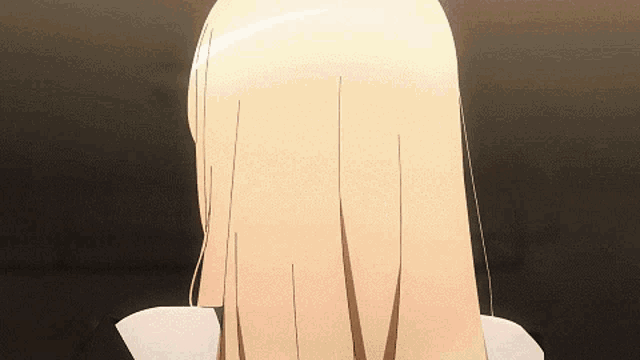 a close up of a blonde haired anime character